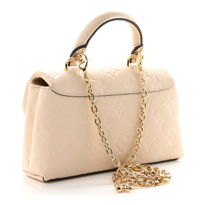 Louis Vuitton Empreinte Monogram Nano Madeleine Creme 3 of 10