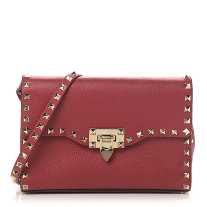 Valentino Garavani Pebbled Calfskin Medium Rockstud Flip Lock Crossbody Bag Red 1 of 5