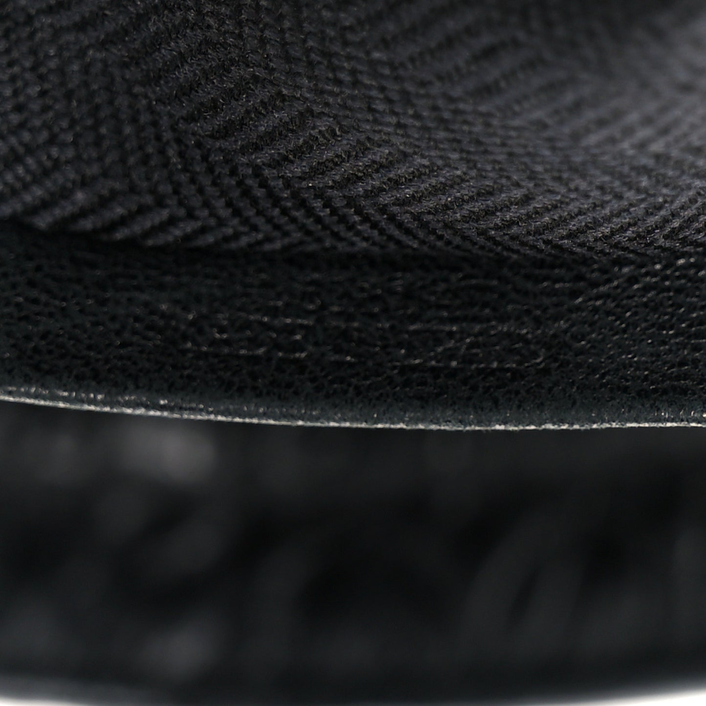 Calfskin Embossed Repeat T Pouch Black