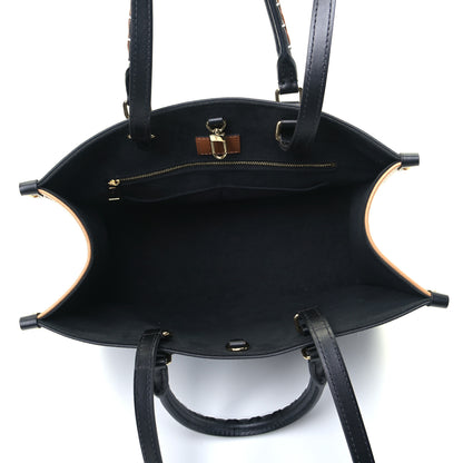 Louis Vuitton Empreinte Monogram Giant Wild At Heart Onthego MM Black 4 of 4