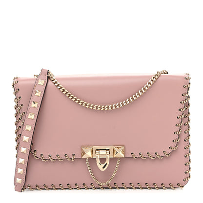 Valentino Garavani Vitello Groumette Small Rockstud Demilune Shoulder Bag Lipstick 1 of 9