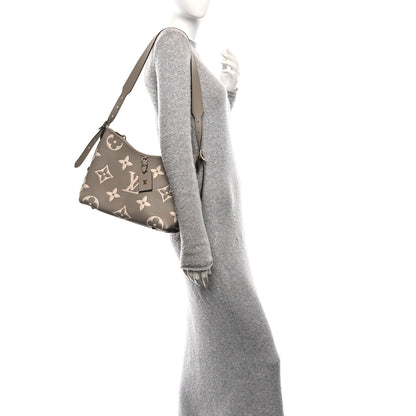 Louis Vuitton Empreinte Monogram Giant CarryAll PM Tourterelle Creme 2 of 10