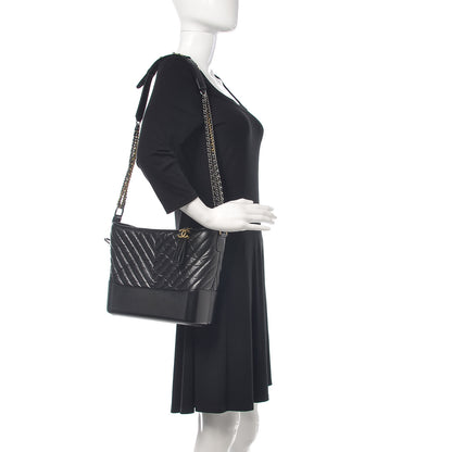 Chanel Aged Calfskin Chevron Quilted Medium Gabrielle Hobo Black 2 of 11