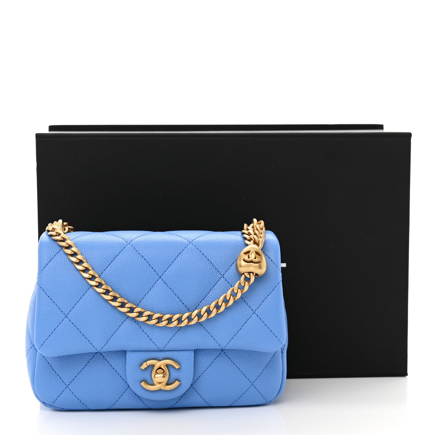 Caviar Quilted Mini Sweetheart Flap Blue