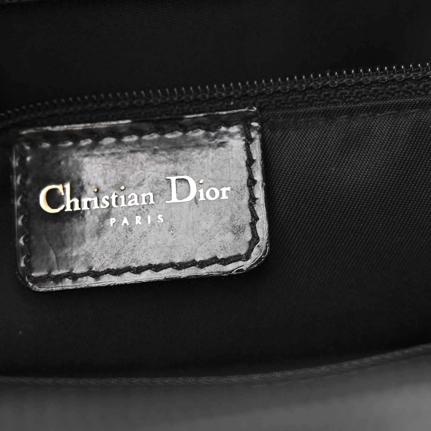 Patent Calfskin Embossed Saddle Bowler Black