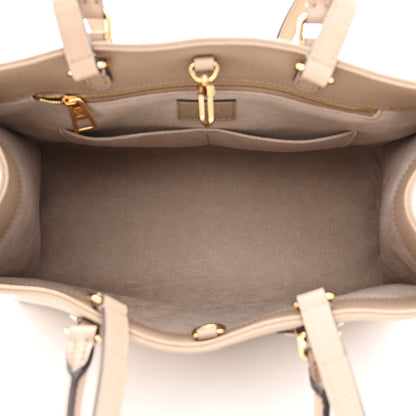 Louis Vuitton Empreinte Monogram Giant Onthego MM Tourterelle 5 of 9