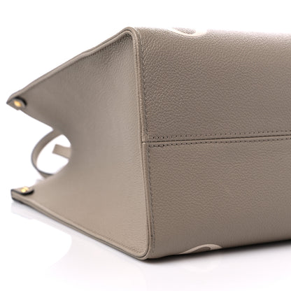 Louis Vuitton Empreinte Monogram Giant Onthego MM Tourterelle Creme 8 of 12