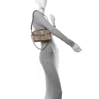 Louis Vuitton Empreinte Monogram Giant Pochette Metis East West Tourterelle Creme 2 of 10