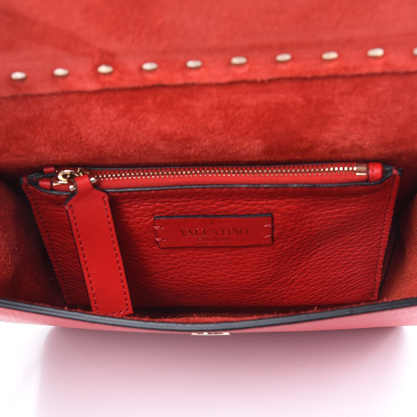 Pebbled Calfskin Rockstud Side Slip Crossbody Rouge Pur