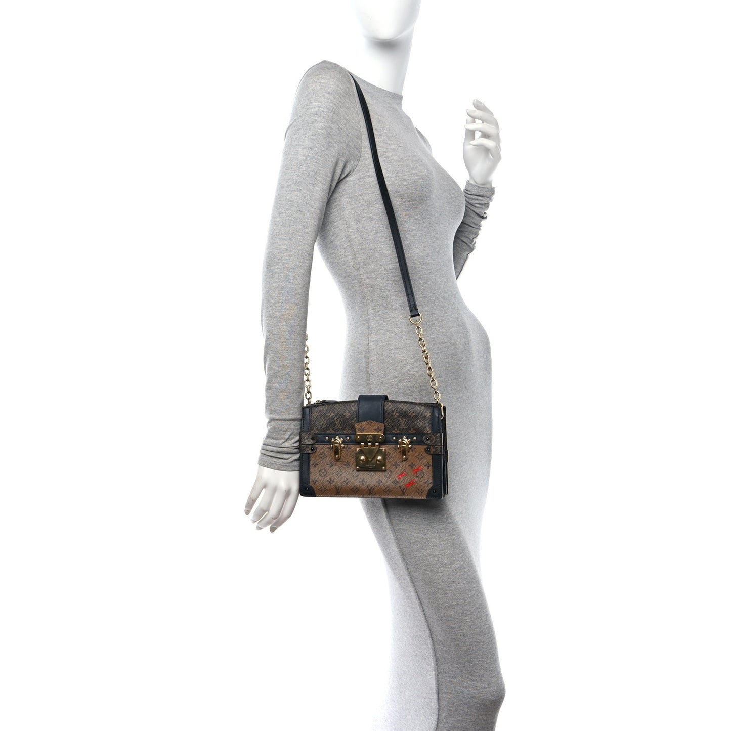 Reverse Monogram Trunk Clutch