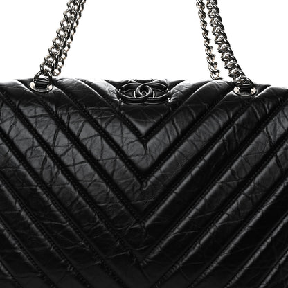 Chanel Aged Calfskin Chevron Quilted Duffle Bag Black 8 of 10