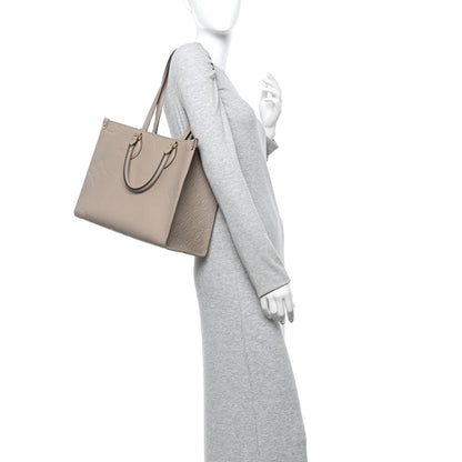 Louis Vuitton Empreinte Monogram Giant Onthego MM Tourterelle 2 of 13