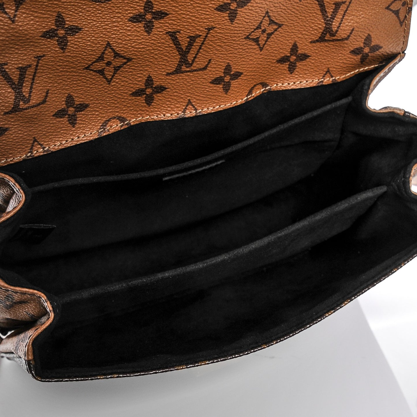 Reverse Monogram Pochette Metis