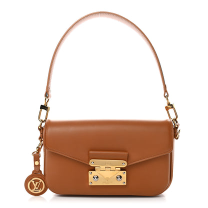 Louis Vuitton Calfskin Monogram Swing Cuir 1 of 9