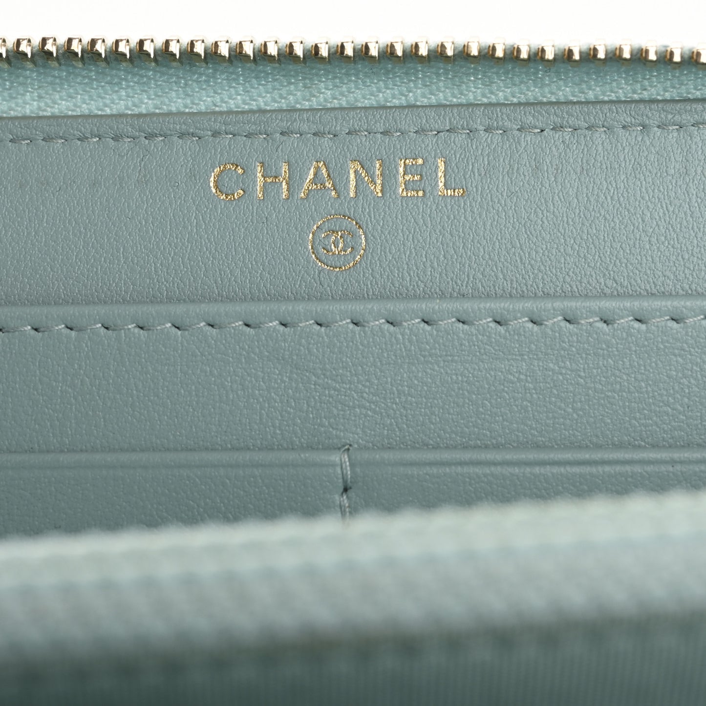 Caviar Quilted Large Filigree Zip Around Wallet Blue