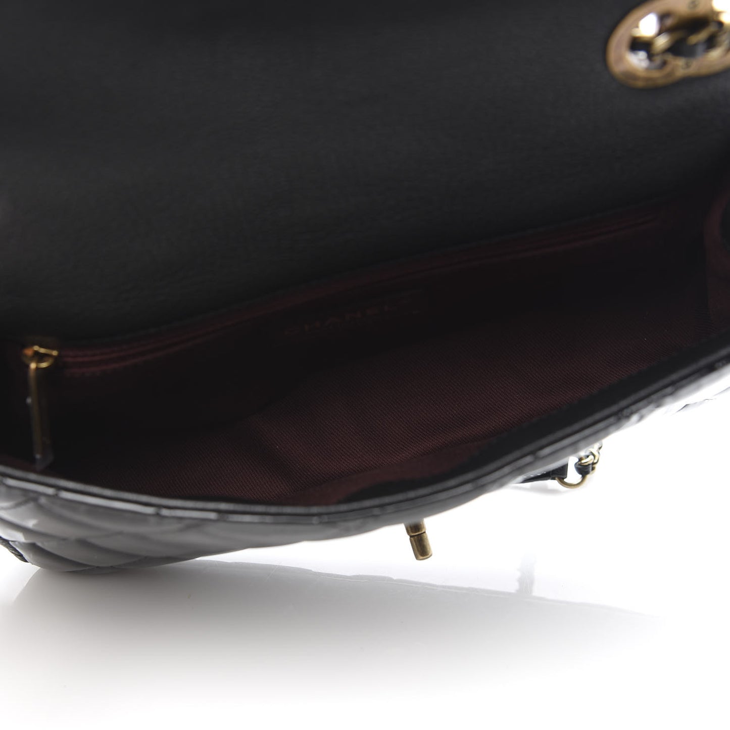 Patent Goatskin Quilted Medium CC Eyelet Flap Black