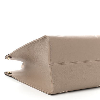 Louis Vuitton Empreinte Monogram Giant Onthego MM Tourterelle Creme 9 of 10
