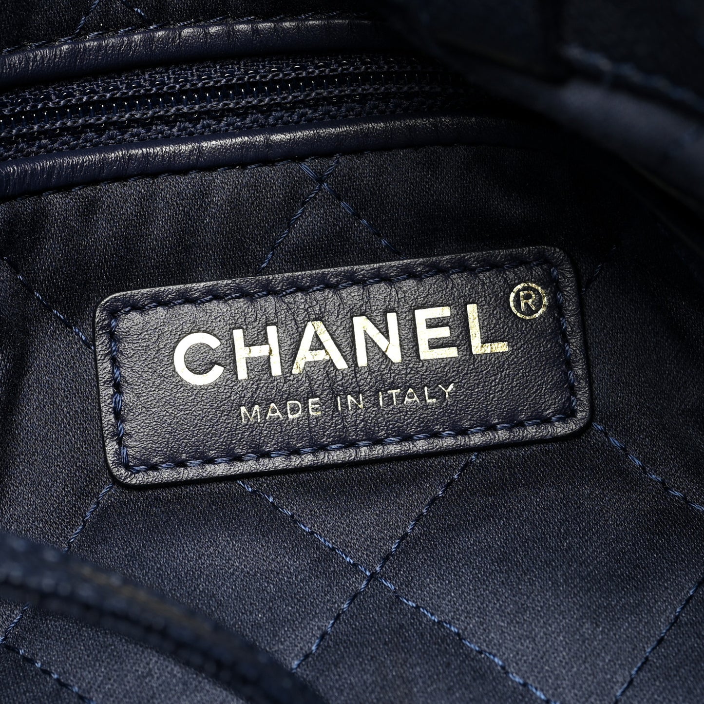 Shiny Caviar Quilted Chanel 22 Backpack Dark Blue