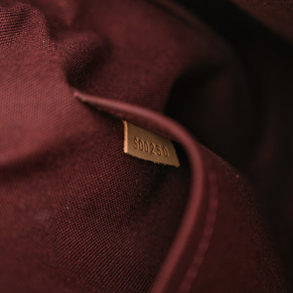 Louis Vuitton Monogram Rivoli MM 7 of 10