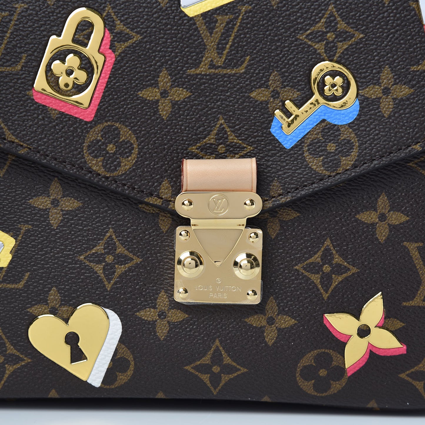Monogram Love Lock Pochette Metis