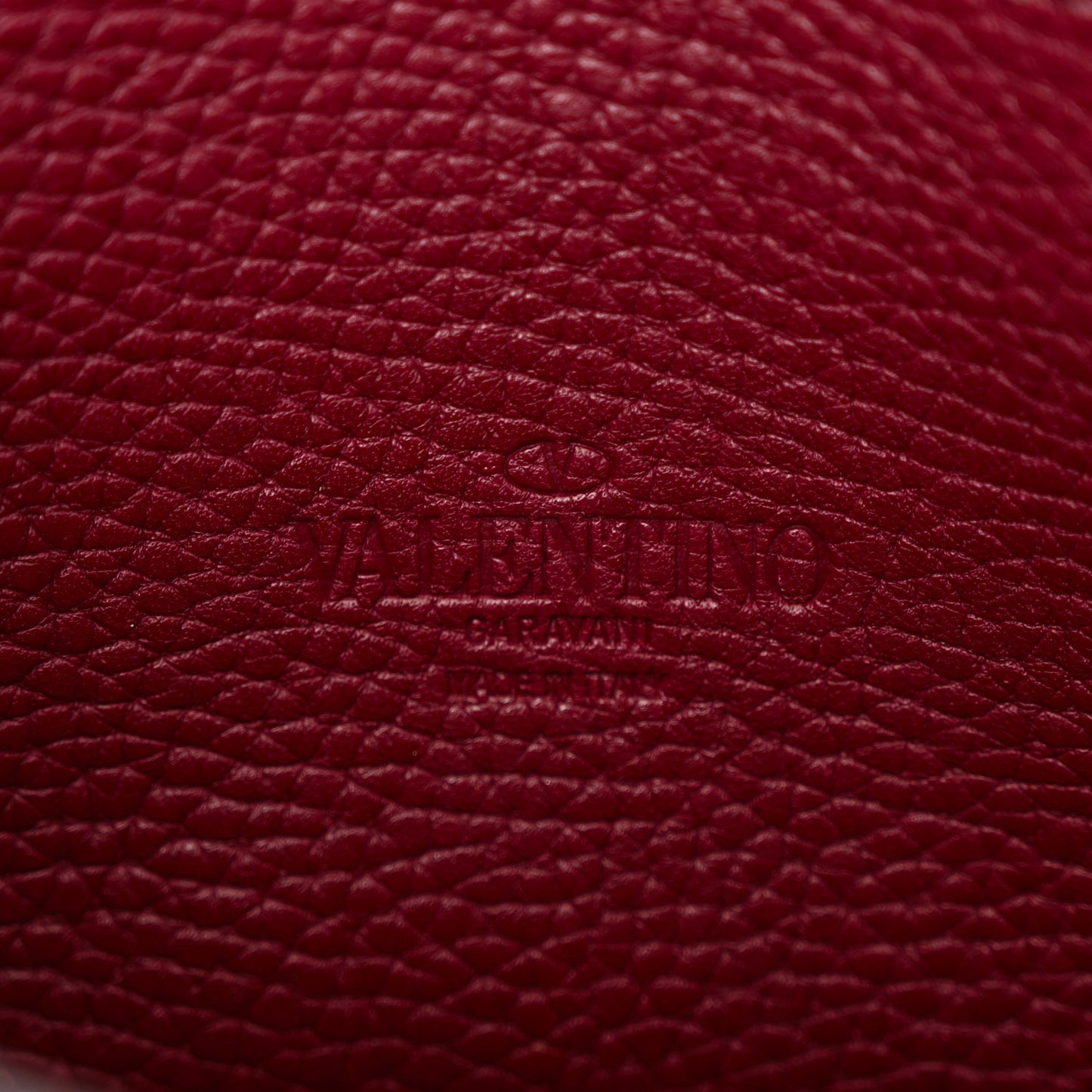 Pebbled Calfskin Medium Rockstud Flip Lock Crossbody Bag Rubin