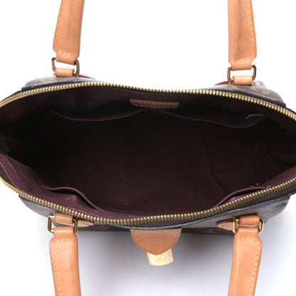 Louis Vuitton Monogram Rivoli MM 7 of 8