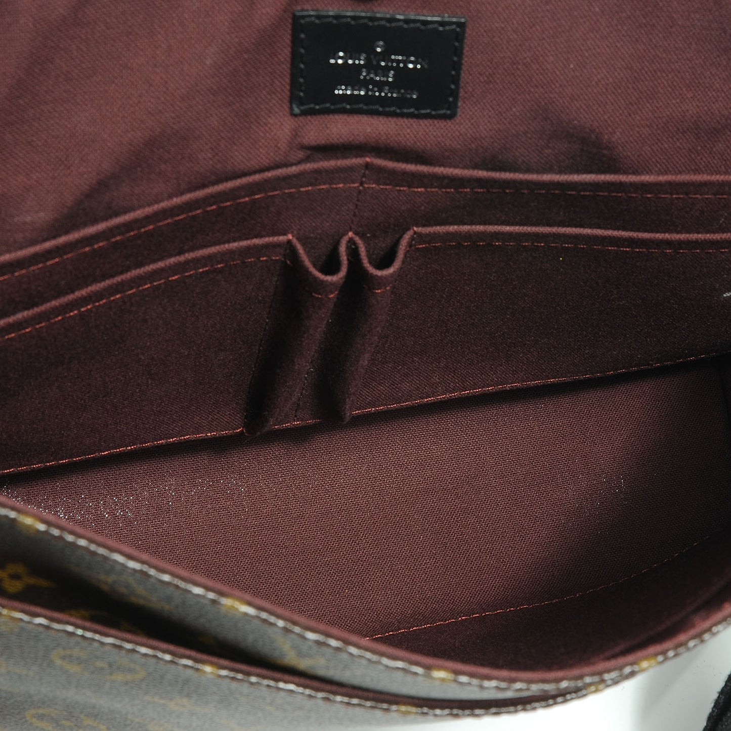 Monogram Macassar District MM