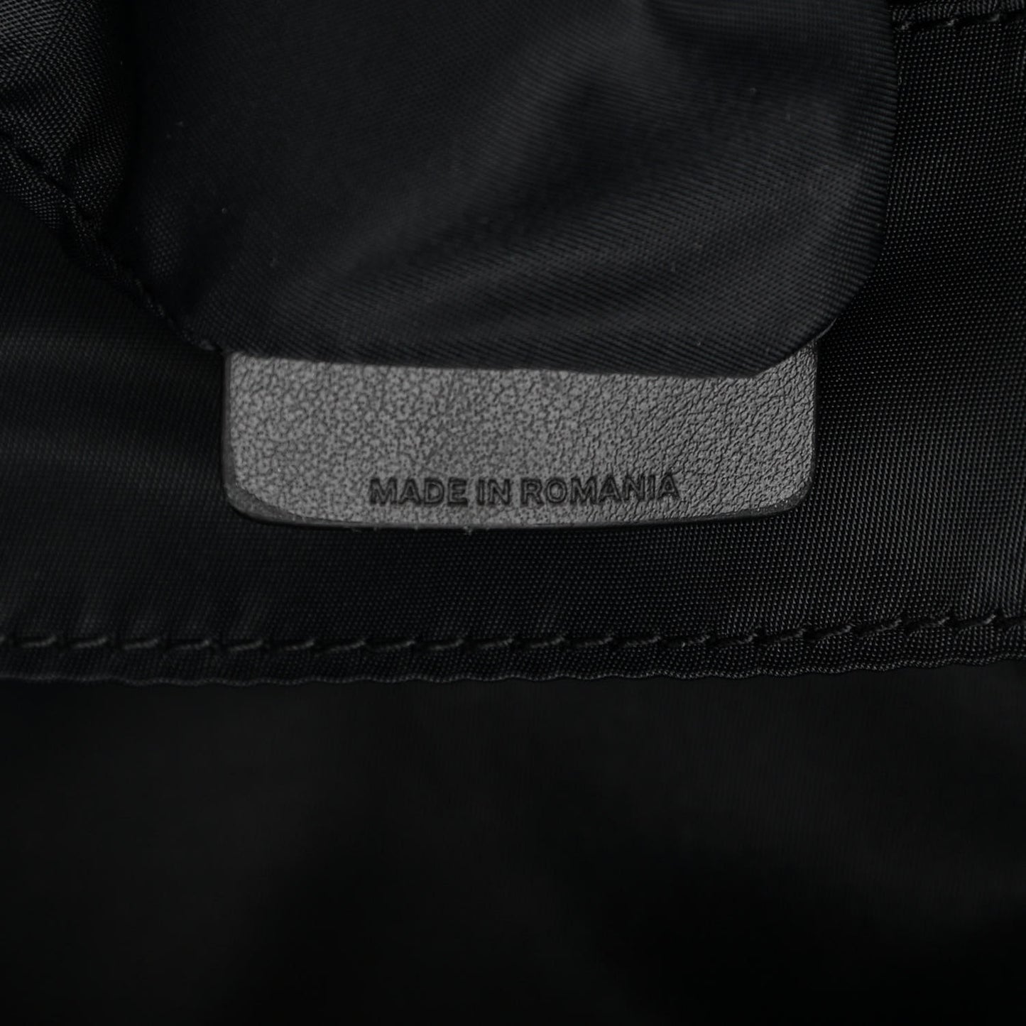 Calfskin Logo Embossed Backpack Black
