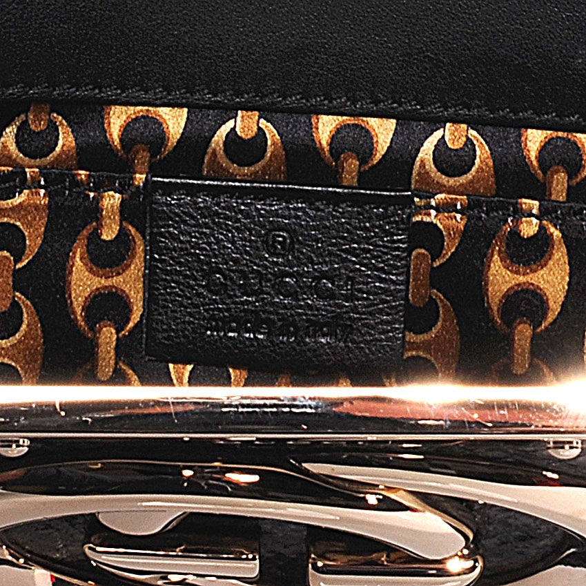 Python Britt Interlocking G Starlight Clutch Black