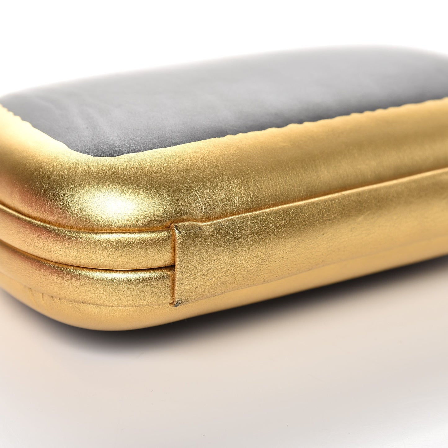 Gilded Waxed Leather Knot Clutch Gold Black