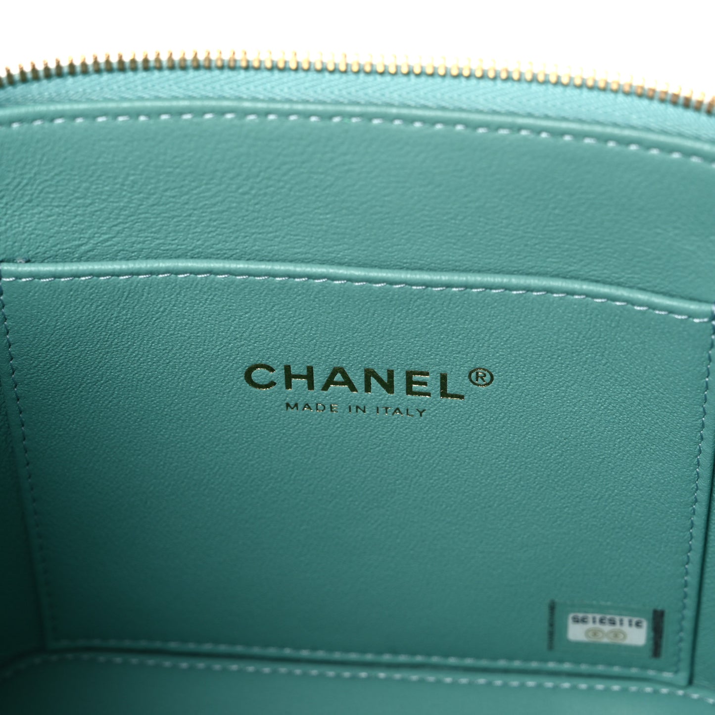 Caviar Quilted Small Top Handle Vanity Case With Chain Light Blue