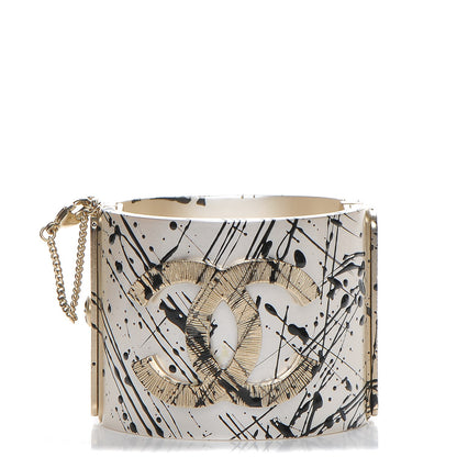 Chanel Matte Jackson Pollock Splattered Paint CC Cuff Ivory 1 of 7
