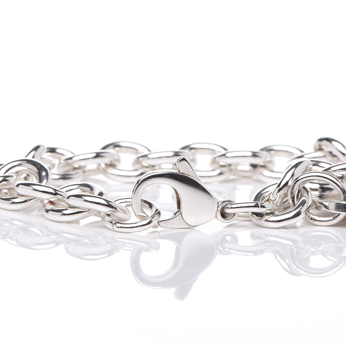 Sterling Silver Return to Round Tag Charm Bracelet