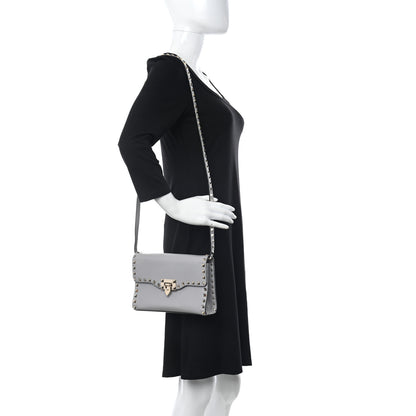 Valentino Garavani Pebbled Calfskin Medium Rockstud Flip Lock Crossbody Bag Pastel Grey 2 of 12