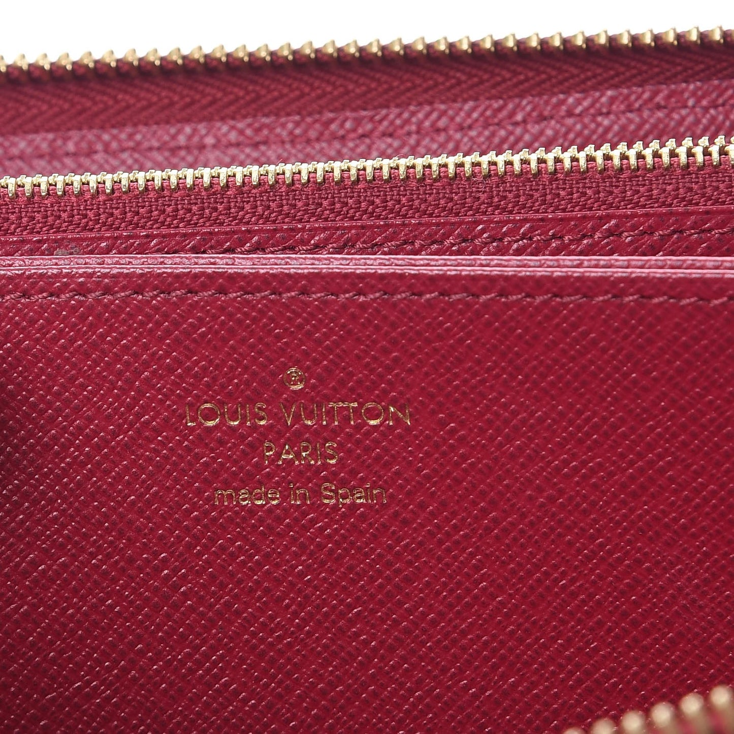 Monogram Pompon Zippy Wallet Fuchsia