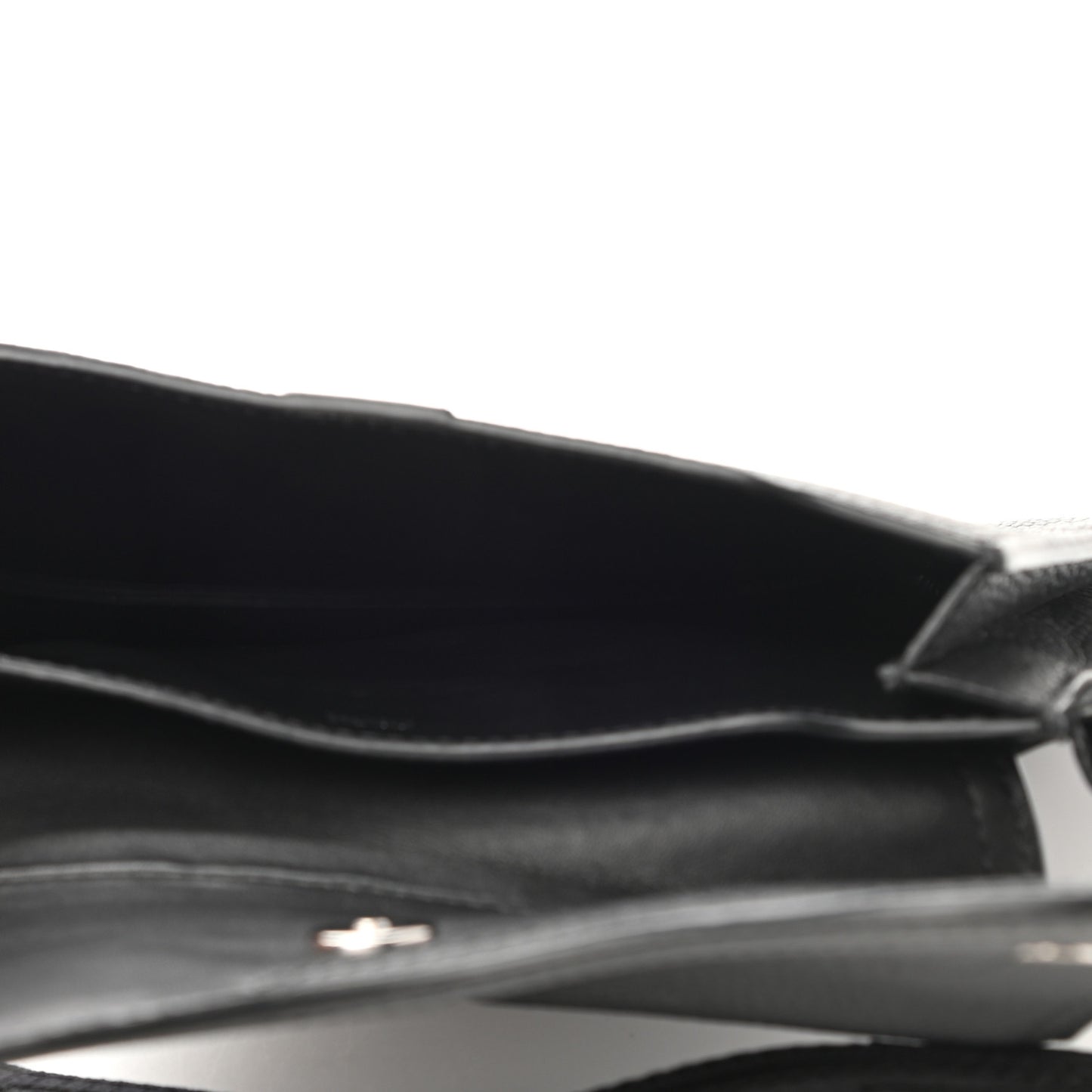 X KAWS Grained Calfskin Saddle Wristlet Black