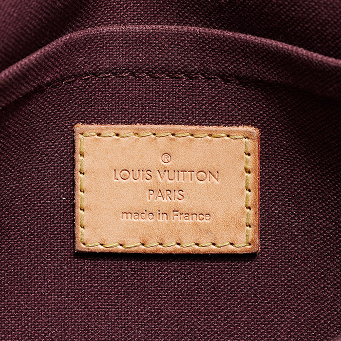 close up image of authentic louis vuitton trademark stamp FASHIONPHILE