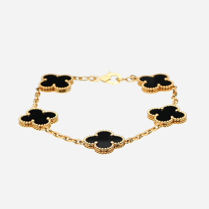product image of yellow gold black Van Cleef & Arpels Alhambra bracelet for men FASHIONPHILE