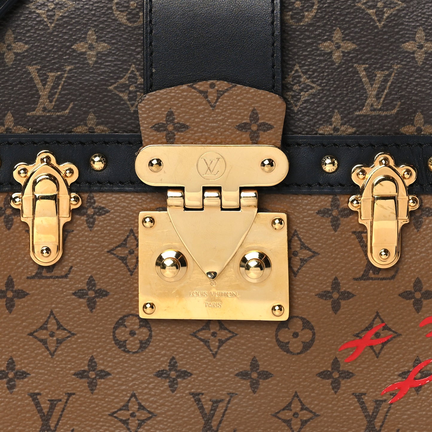 Reverse Monogram Trunk Clutch