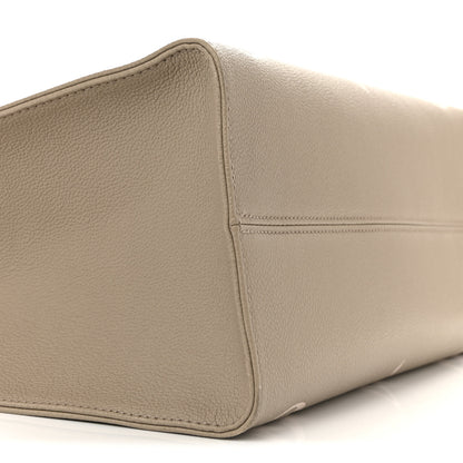 Louis Vuitton Empreinte Monogram Giant Onthego MM Tourterelle Creme 8 of 13
