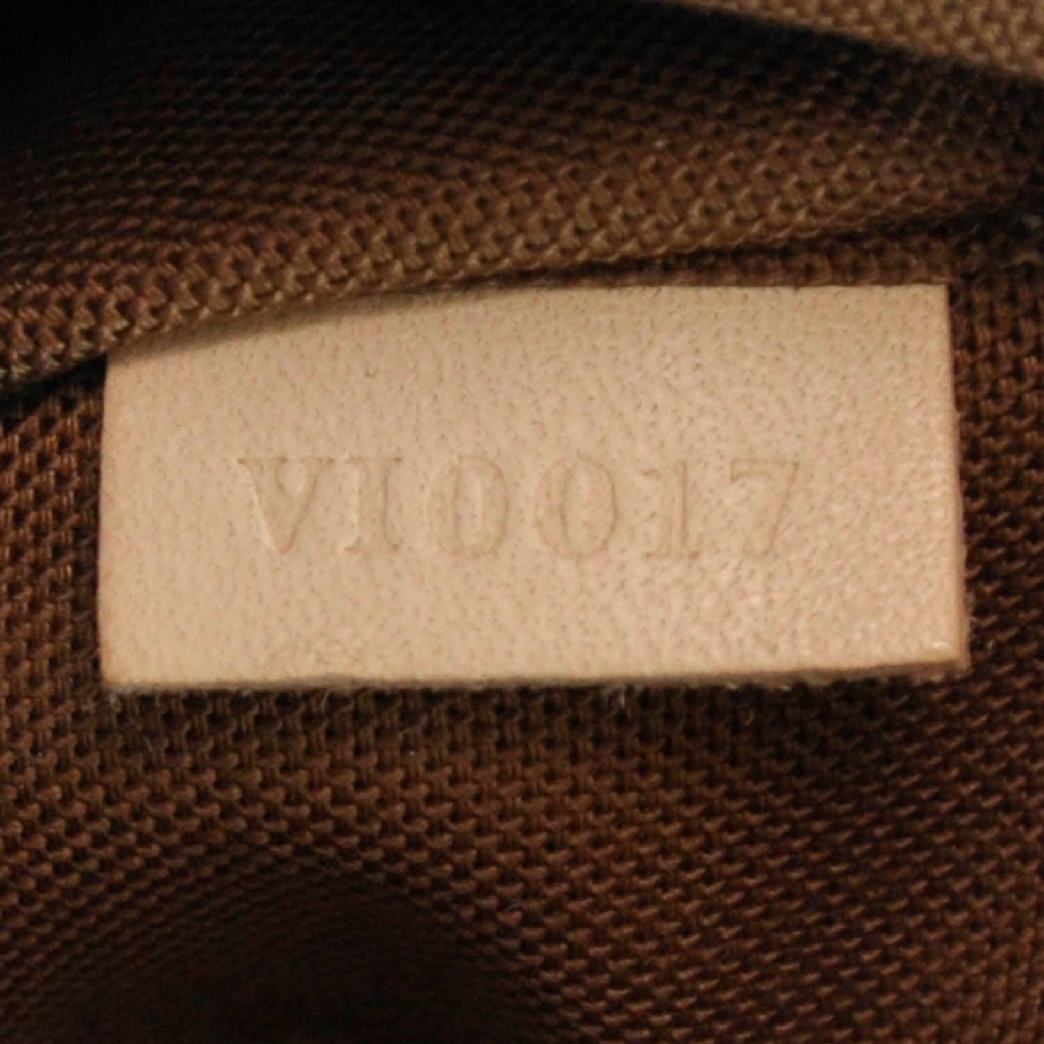 Louis Vuitton Monogram Riveting 9 of 9