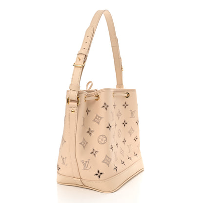 Louis Vuitton Calfskin Monogram Cutout Petit Noe Neutral 3 of 9