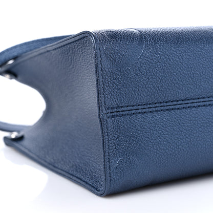 Louis Vuitton Metallic Empreinte Monogram Giant Onthego PM Navy Nacre 6 of 8