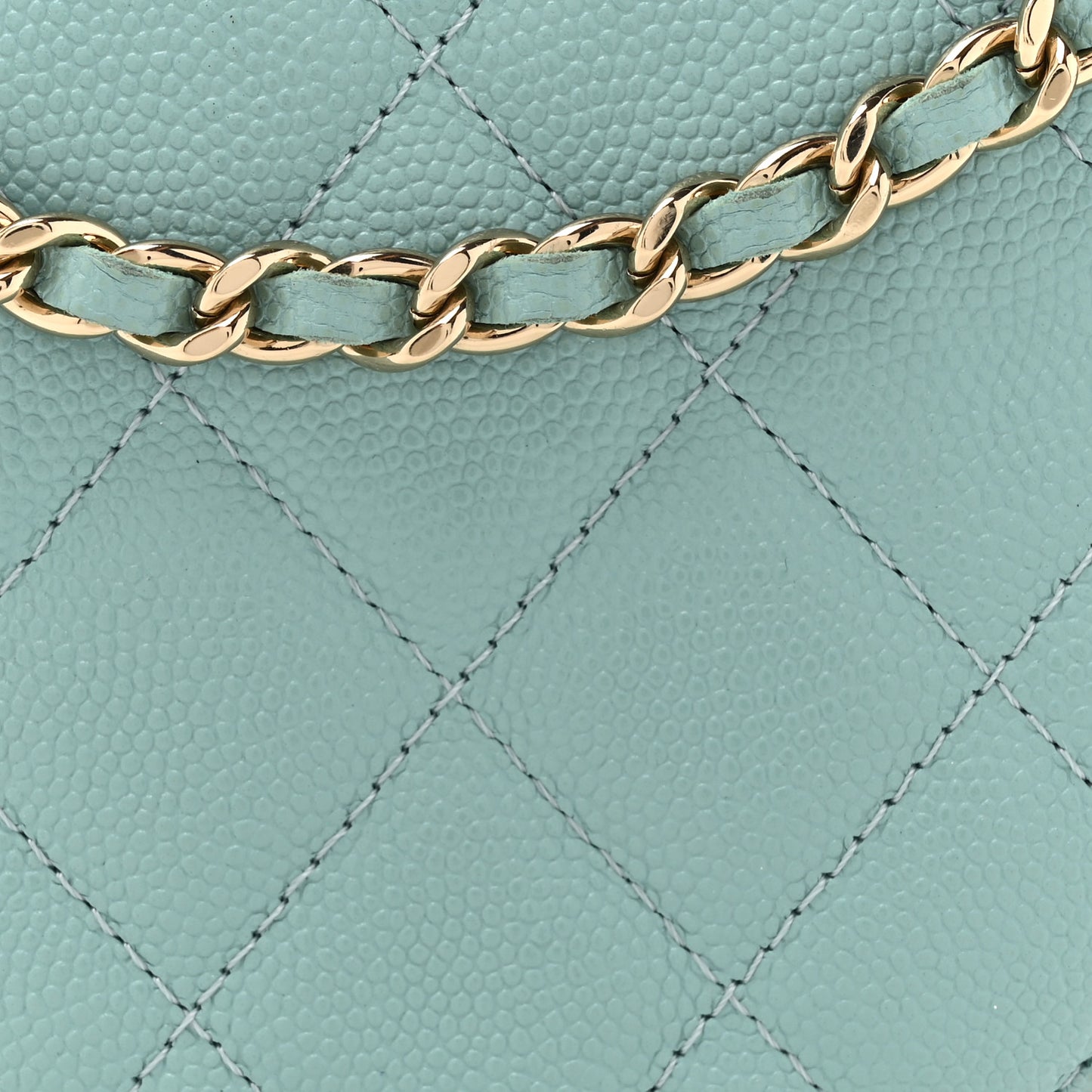Caviar Quilted Round Clutch With Chain Light Blue