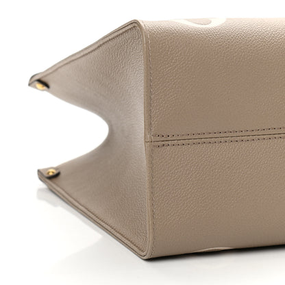 Louis Vuitton Empreinte Monogram Giant Onthego MM Tourterelle Creme 7 of 7