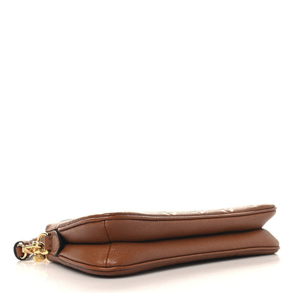 Louis Vuitton Empreinte Monogram Liv Pochette Cognac 4 of 11