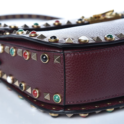 Valentino Garavani Pebbled Calfskin Medium Rockstud Rolling Flap Saddle Bag Rubin 7 of 9