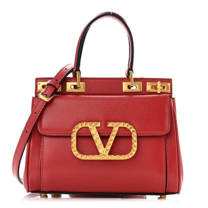 Valentino Garavani Grainy Calfskin Mini Rockstud Alcove Top-Handle Bag Rouge Pur 1 of 10
