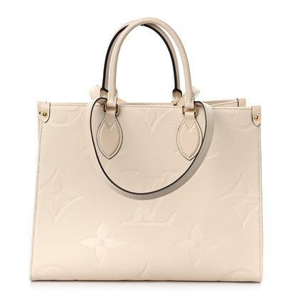 Louis Vuitton Empreinte Monogram Giant Onthego MM Creme 1 of 9