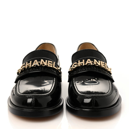 Chanel Shiny Calfskin Logo Loafers 37.5 Black 2 of 8